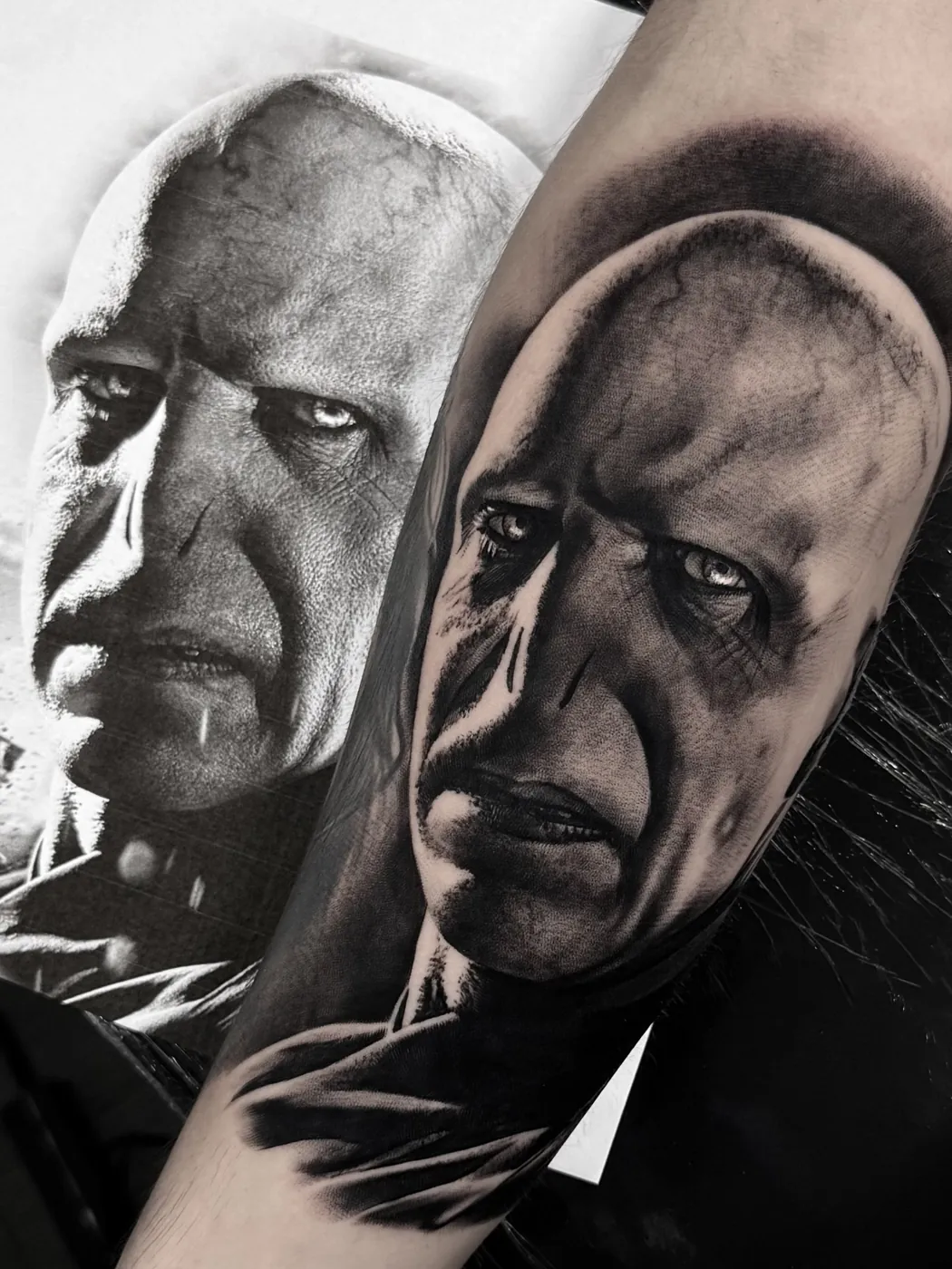 Black and grey villain portrait realism tattoo
